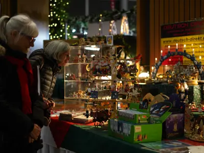 People shopping inside the Rotunda at City Hall