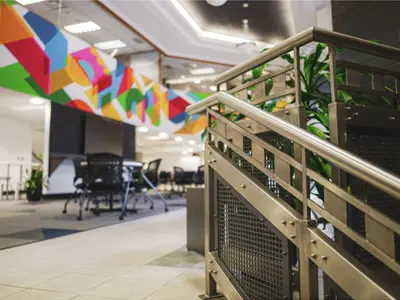 staircase with colourful mural in the background