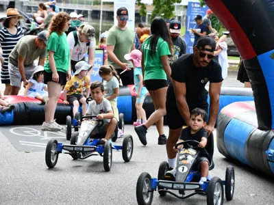 kids racing in go carts